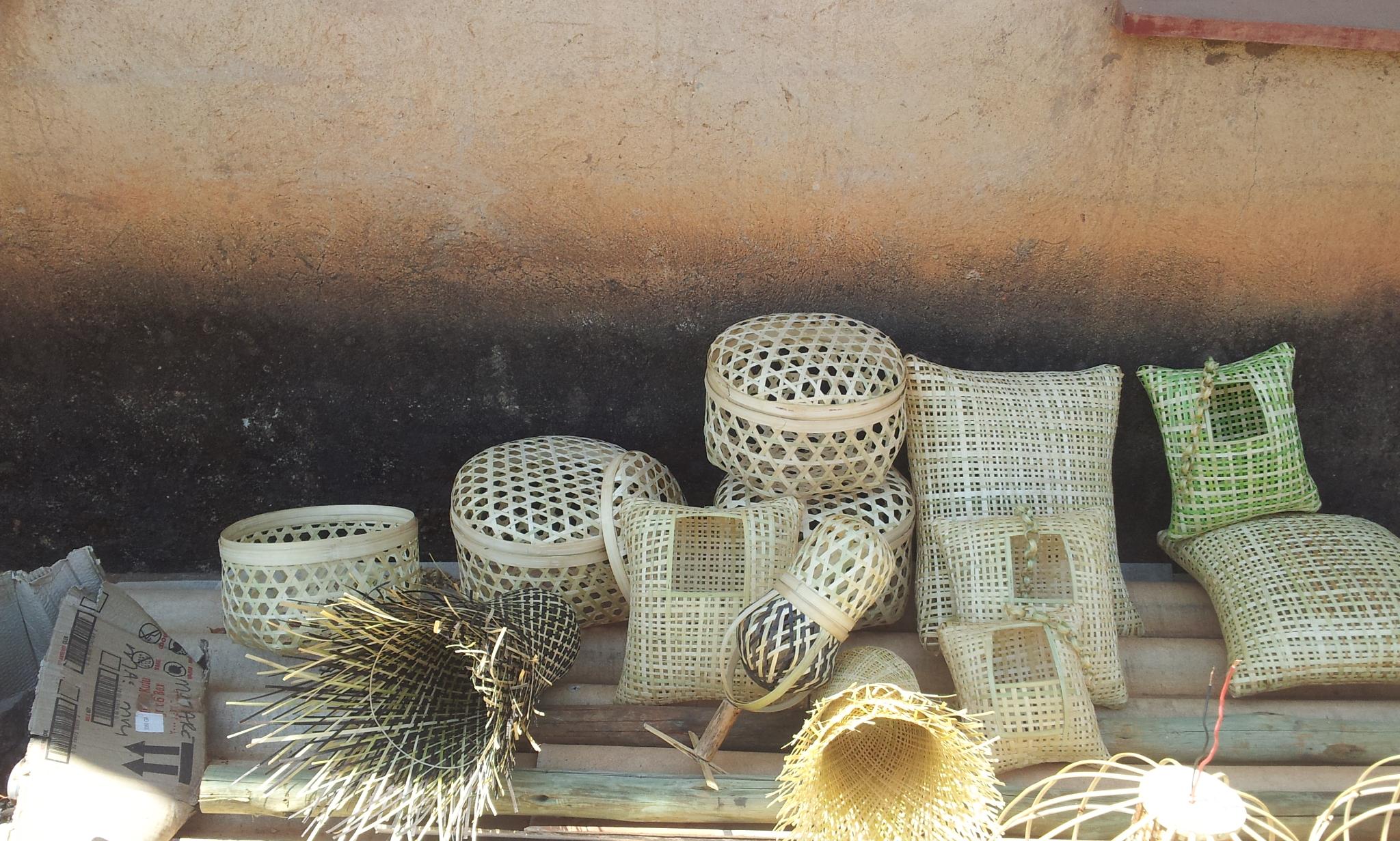 Bamboo woven products including baskets, cushion covers, hats and trays from Zimbabwe's Honde Valley — examples of small-scale commercial handicraft production